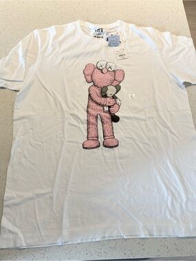 KAWS men’s White T-Shirt with Pink Character Graphic